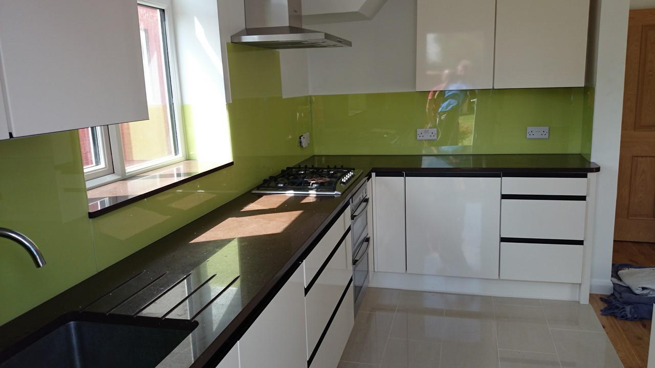 Lime green glass kitchen splashback installed by Walthamstow glaziers